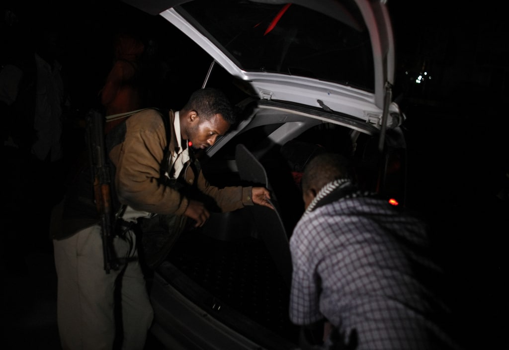 How the SARS menace is affecting workers in the Nigerian tech community 2 Nigerian Policeman searching a vehicle