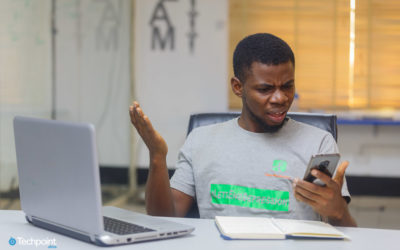 An image of a man upset about something he saw on his phone