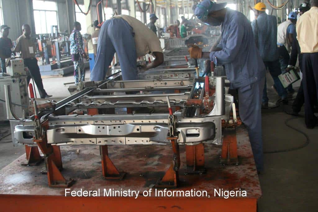 Nigerian forex crisis and the collateral damage to local businesses 5 A car assembly plant with workers