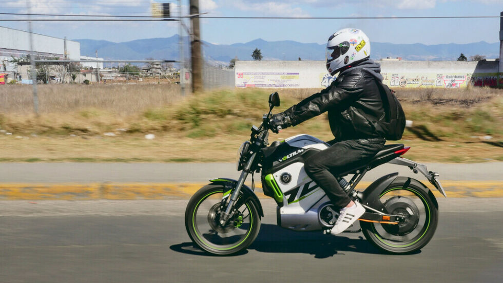 a man on an electric motorcycle