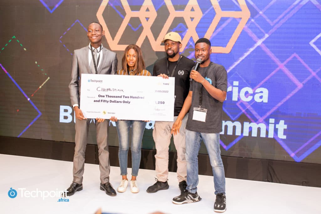 Team Chemotronix, 2 others win $2,500 cash prize at TABS Web3 Hackathon 5 Team Chemotronix receiving cash prize with Ekene Egonu