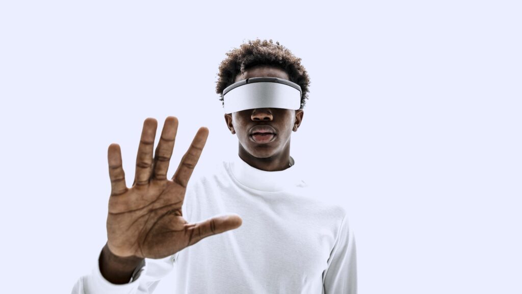 Be at the forefront of innovation: Discover the latest tech trends in Africa at the Lagos Startup Expo 3 man wearing smart glasses touching virtual screen min