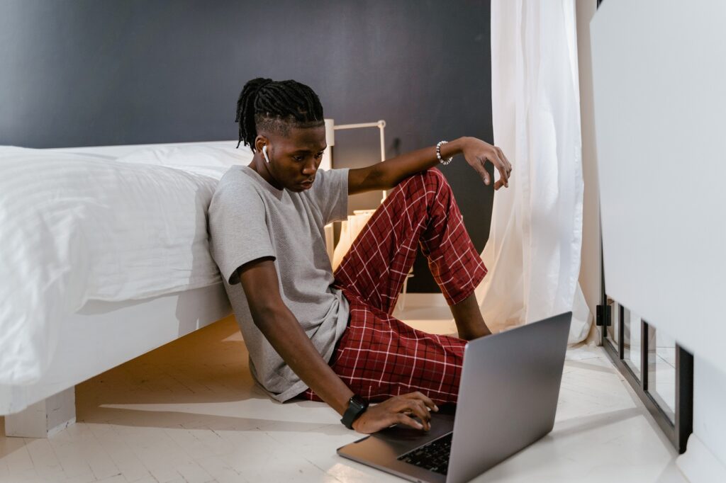 Teraco raises $680m in funding to expand its data centres 2 Young man working on a laptop "tech bro"