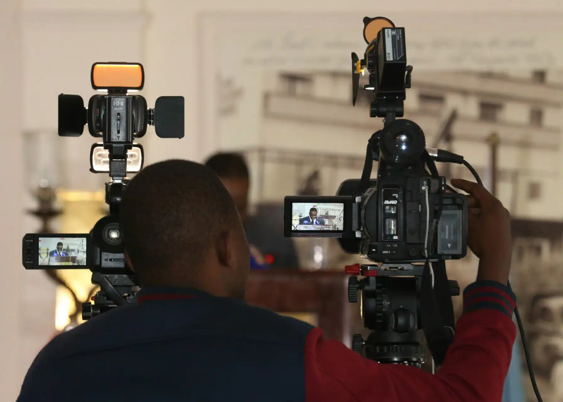 A journalist records Ambassador Francisco Madeira, the Special Representative of the Chairperson of the African Union Commission (SRCC) for Somalia during a Press Conference in Nairobi, Kenya on December 21, 2017. SRCC talks about recent developments on the security front in Somalia especially the progress in the transitioning of the national security responsibility from AMISOM to Somali security forces. AMISOM Photo