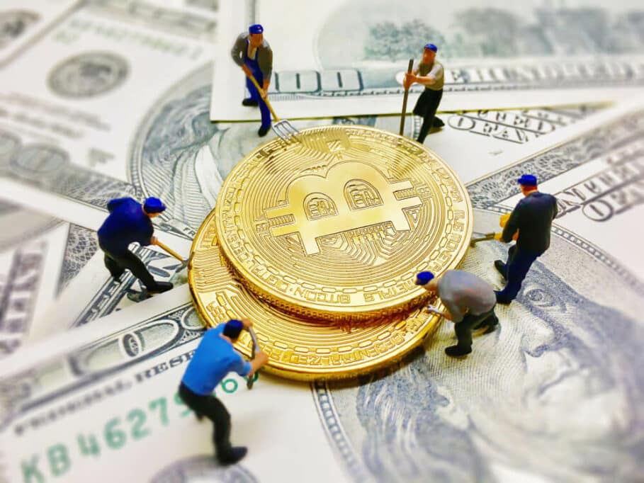 Is Bitcoin on the rise again? Here are 2 things to know before investing 2 worker figures helping dig coin money dollar note background 1