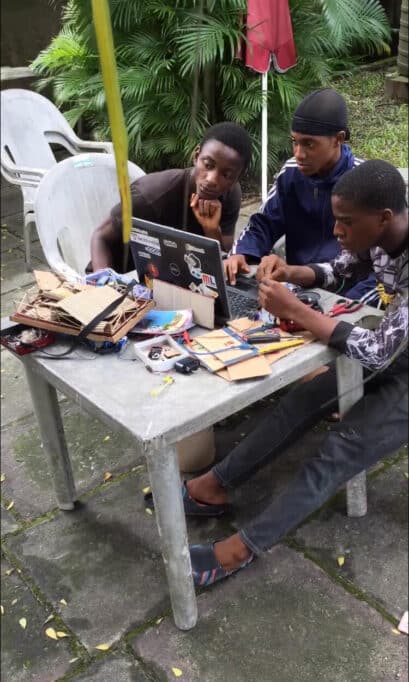 From gesture-controlled toy cars to smart gloves for the blind, this Nigerian teenager is changing how we think about hardware 2 Three teenagers, staring at a laptop