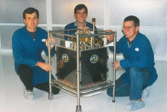 5 interesting facts you didn't know about space exploration in Africa 1 A group of three men kneeling next to what seems to be a satellite device