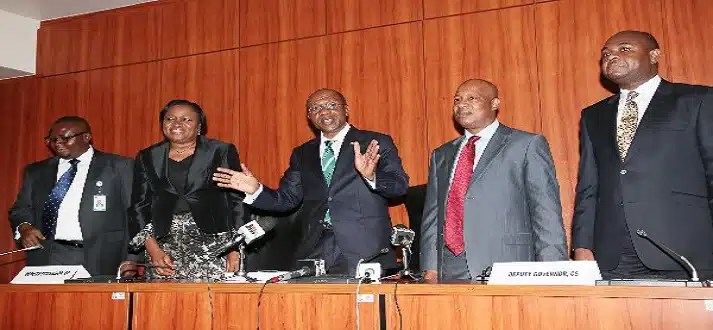 CBN governor announcing naira float in 2016