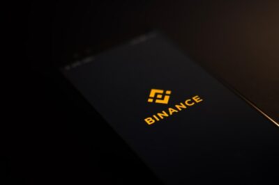 Binance logo on a phone