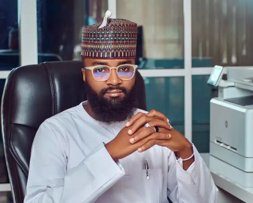 How CWCD is using tech to effect social change in Nigeria 1 A picture of Khalil Suleiman Halilu. He's seated on a black leather chair in what appears to be an office enviroment.