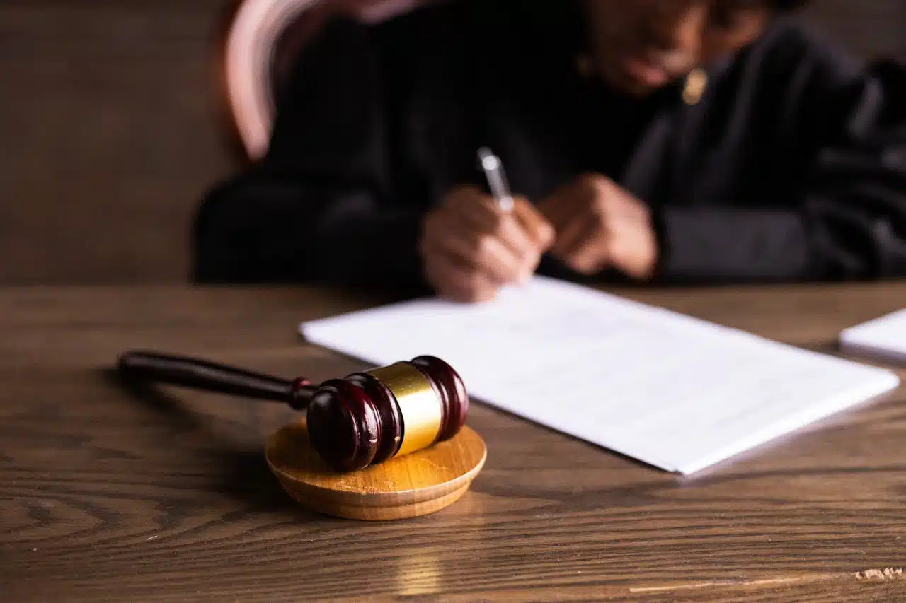 image of a lawyer signing on a paper