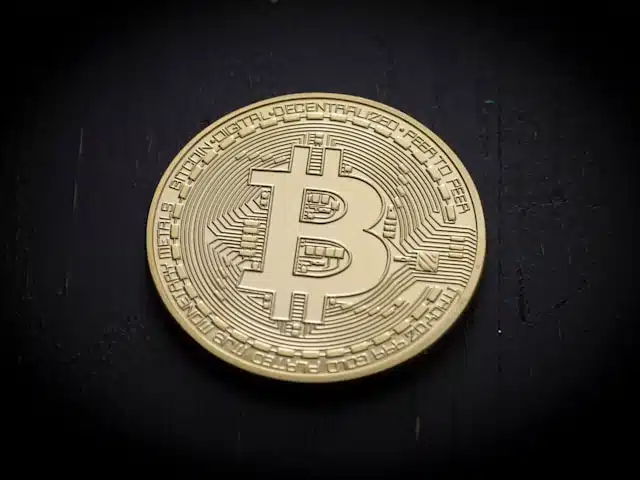 An image of bitcoin coin on a black background