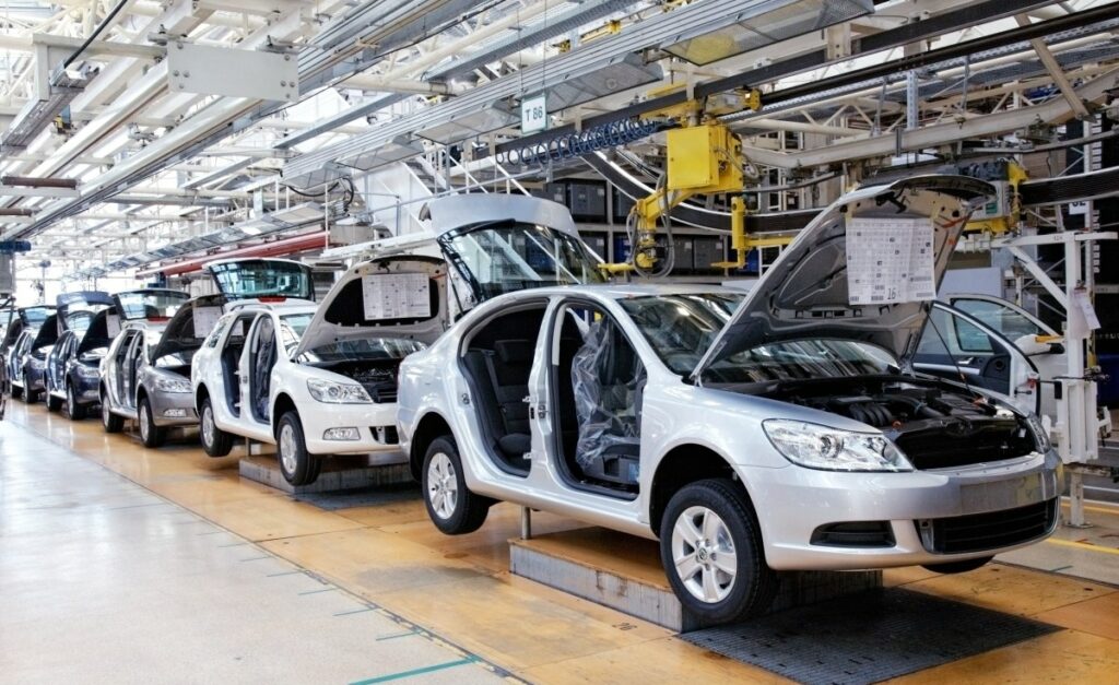 Japan's Toyota rules Nigerian roads, but Chinese challengers are coming with a strategy 2 An assembly line of Peugeot cars